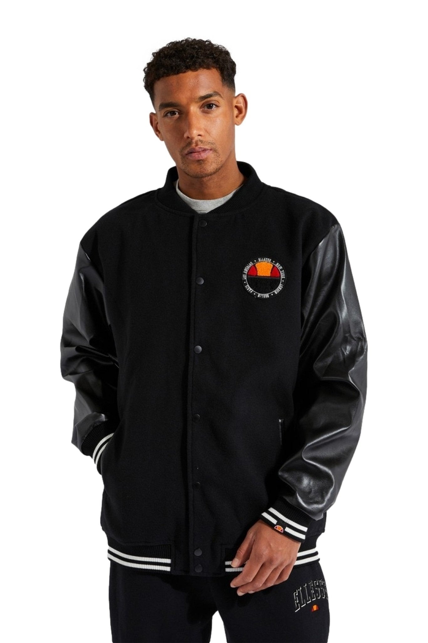 CAZADORA ELLESSE NEGRA NOTRE JACKET BLACK - AREA ZERO