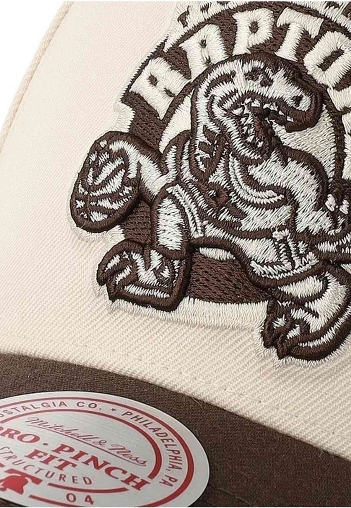 GORRA MITCHELL & NESS CRUDA TORONTO RAPTORS BROWN & CREAM PRO SNAPBACK