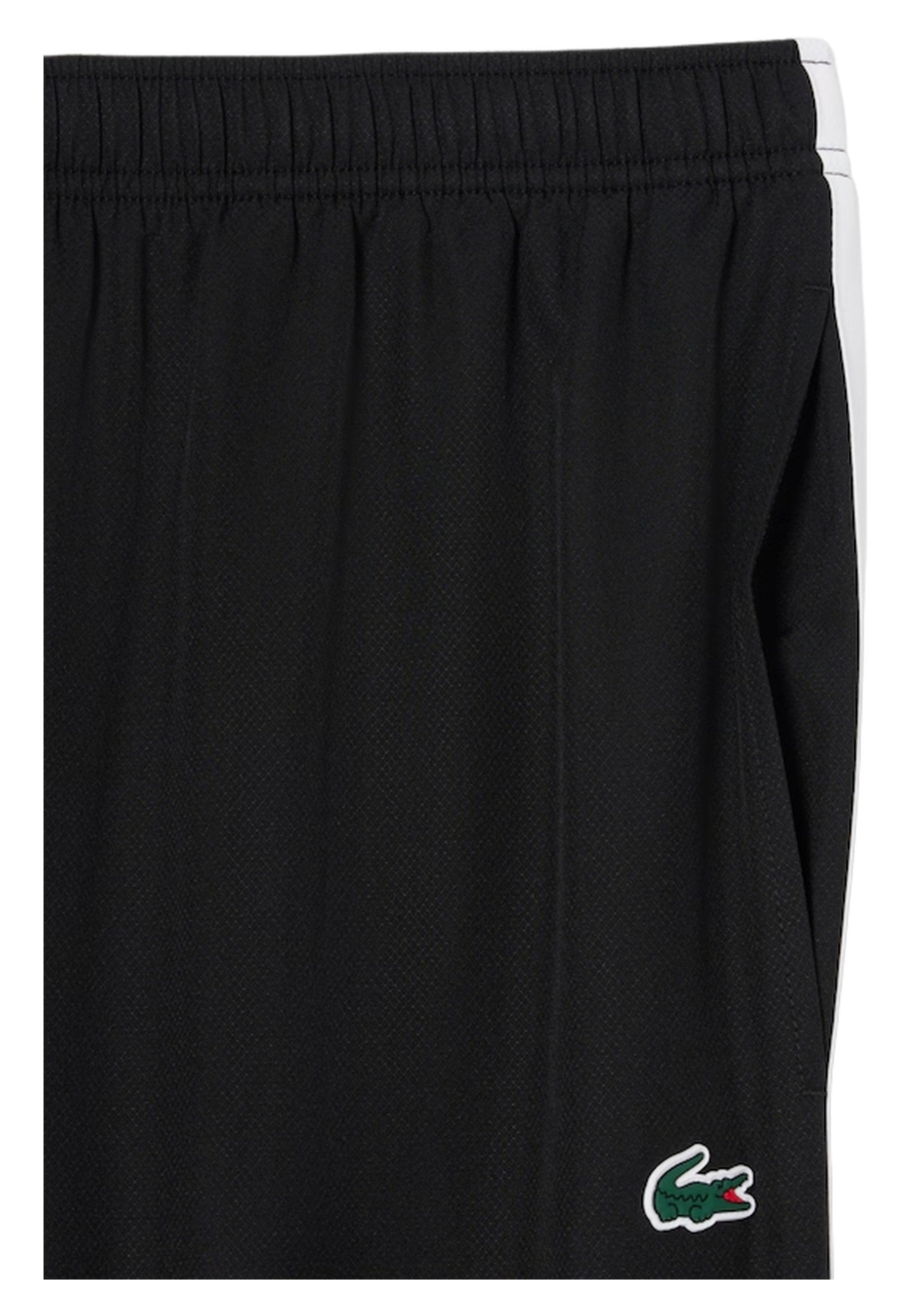 PANTALON LACOSTE NEGRO CHANDAL TAPERED TACKPANT