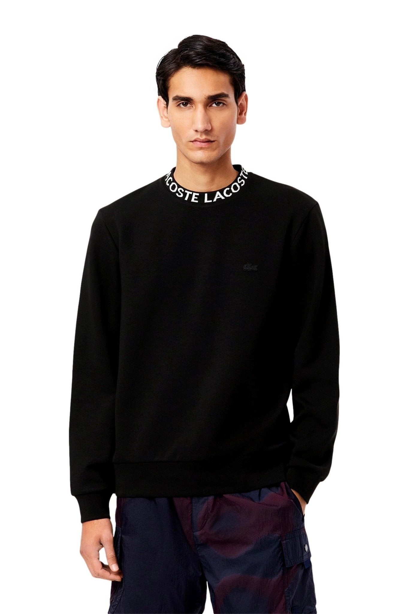 SUDADERA LACOSTE NEGRA JAQUARD TAPE CREWNECK - AREA ZERO