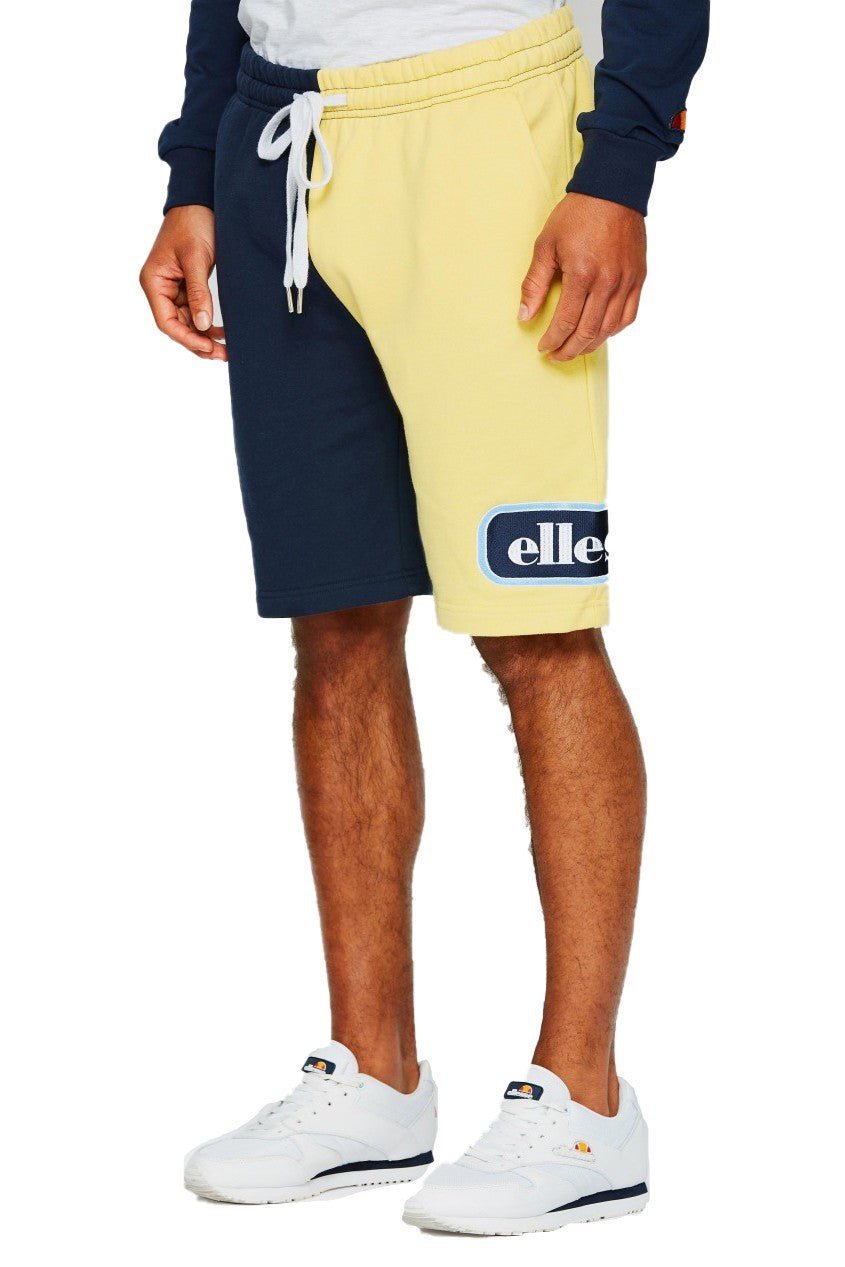 BERMUDA ELLESSE AMARILLA OVERSIZED LOGO BORDADO - AREA ZERO
