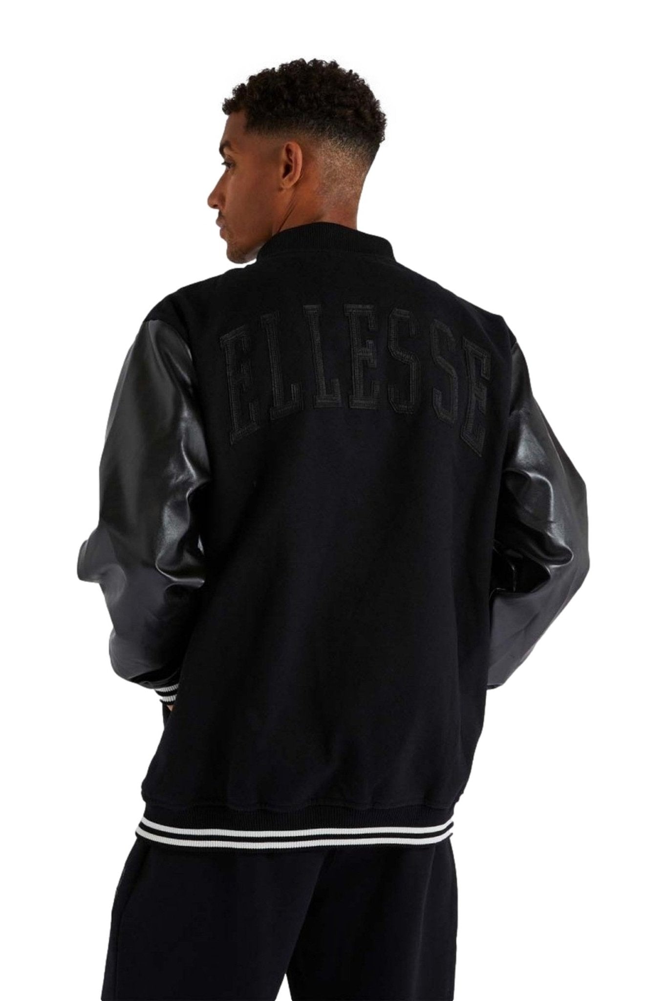 CAZADORA ELLESSE NEGRA NOTRE JACKET BLACK - AREA ZERO