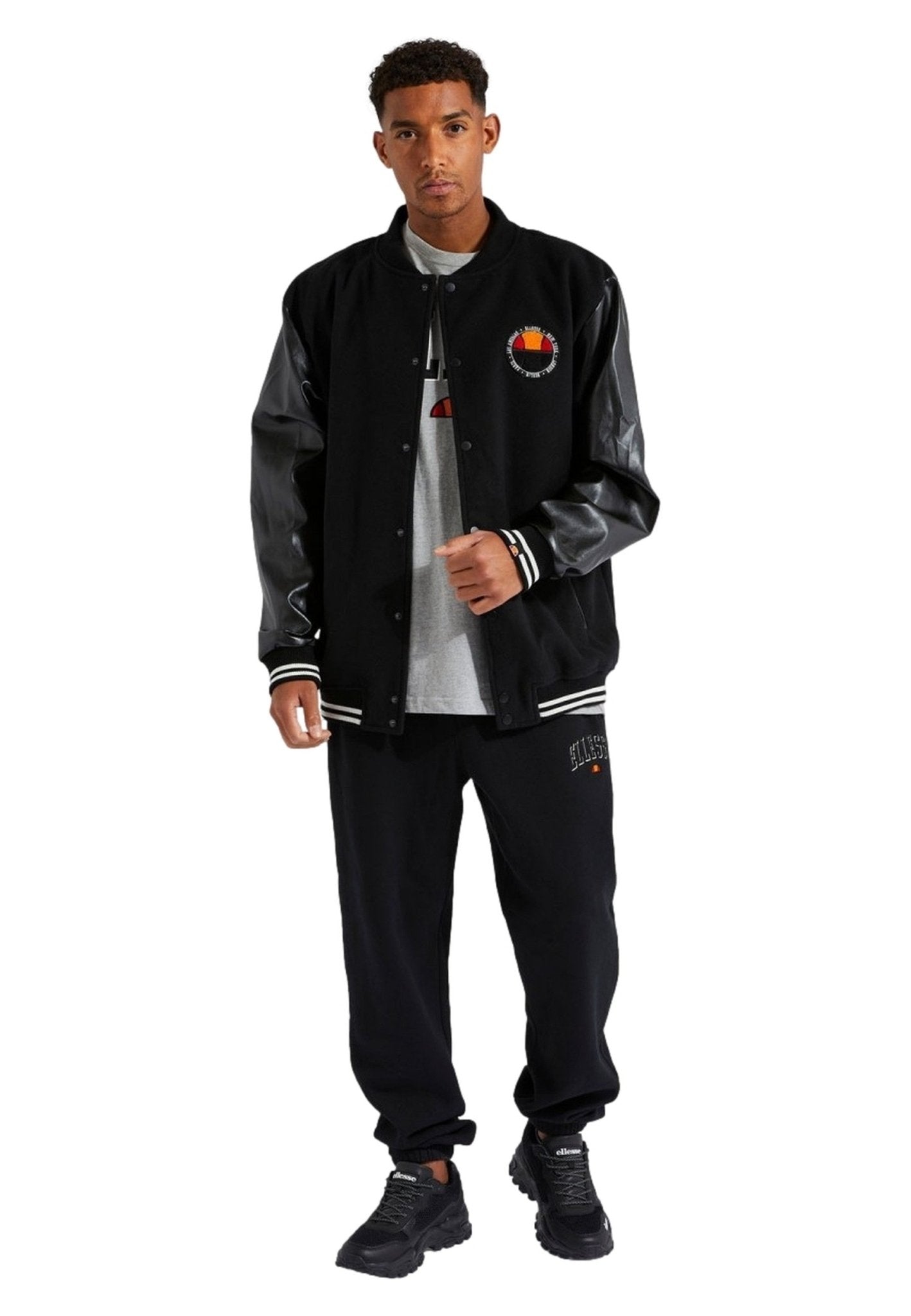 CAZADORA ELLESSE NEGRA NOTRE JACKET BLACK - AREA ZERO