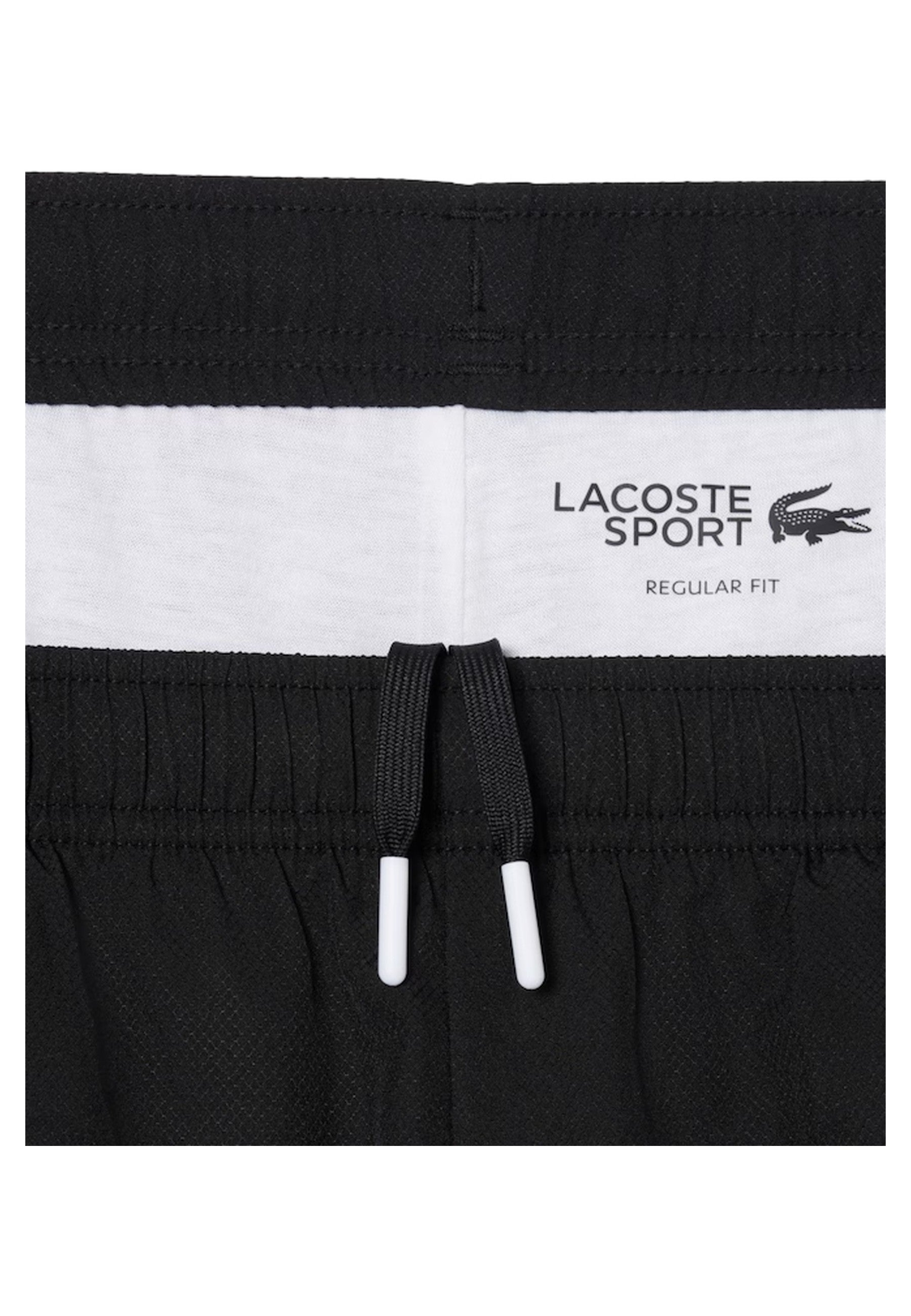 PANTALON LACOSTE NEGRO CHANDAL TAPERED TACKPANT