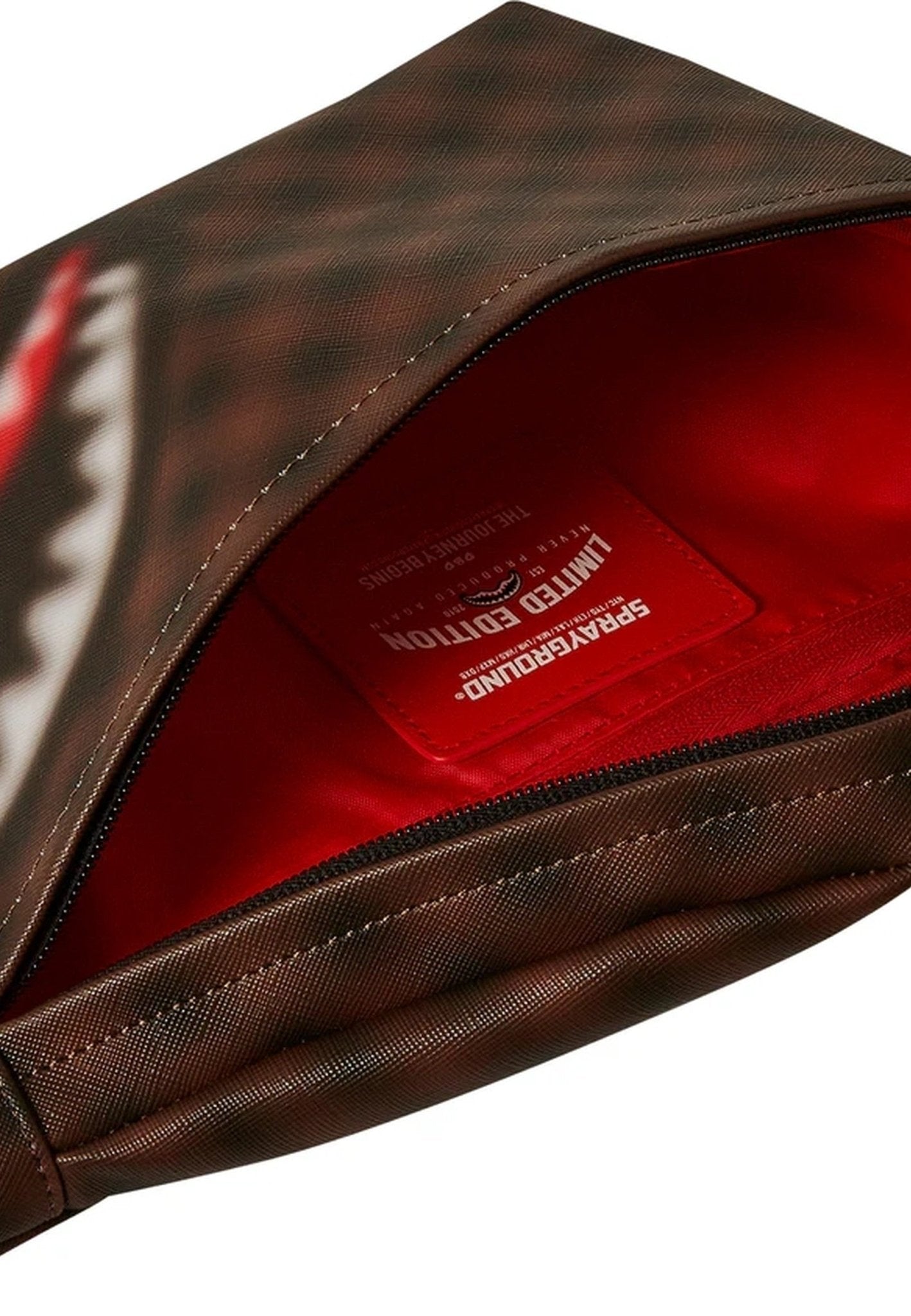 RIÑONERA SPRAYGROUND MARRON SHARKS IN PARIS BLUR SAVVY CROSSBODY - AREA ZERO